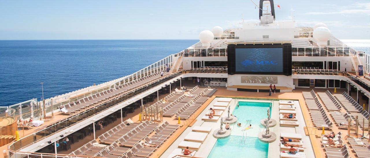 The pool deck where films screen under starry skies