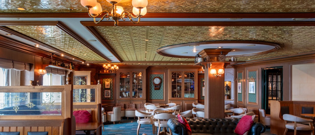 The Rising Sun Pub offers a cozy atmosphere, perfect for relaxing with a drink or enjoying casual dining