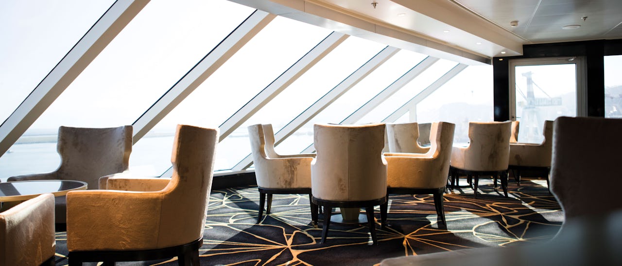 Enjoy the panorama views and live music in the Observation Lounge